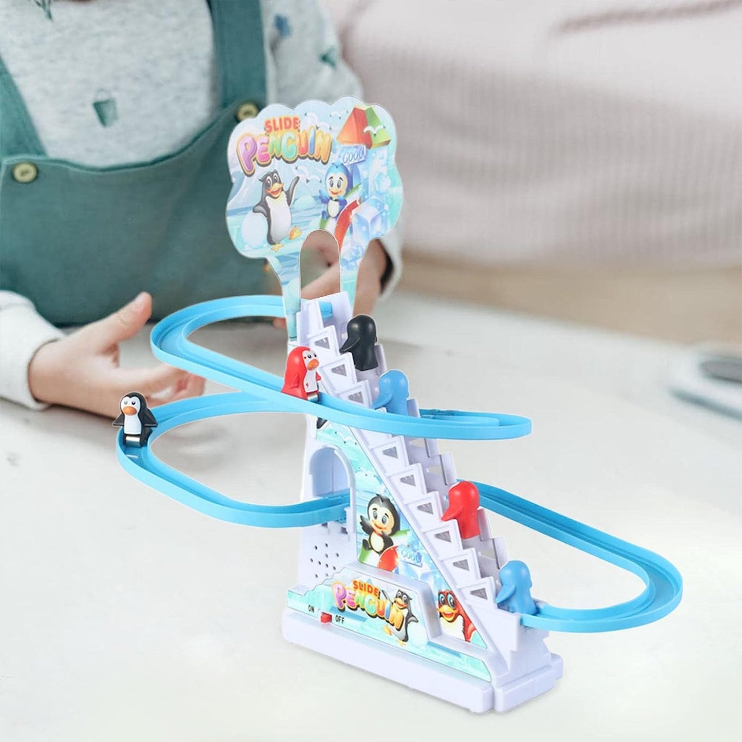 Juguete de pista de pinguinos escaladas